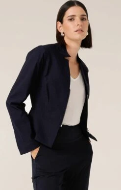 FRONT ZIP PEPLUM JACKET IN NAVY