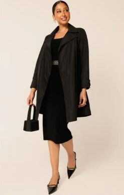 NOIR TRENCH 17 NOIR TRENCH -Clothing Discounts Shop LR NOIRTRENCHINBLACKWITHIRISCAPSLEEVEDRESS19 TERRILC25
