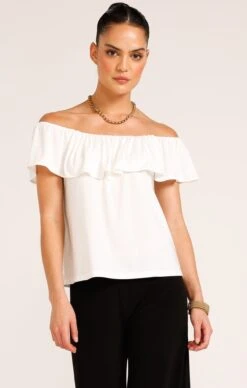 OFF SHOULDER FRILL TOP IN IVORY 11 OFF SHOULDER FRILL TOP IN IVORY -Clothing Discounts Shop LR OFFSHOULDERFRILLTOPIVORYWITHSEAMLESSPANTSINBLACK6 NINAS25