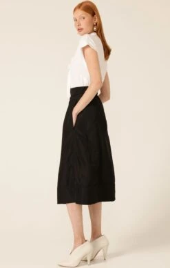 PLEATED A-LINE SKIRT 16 PLEATED A-LINE SKIRT -Clothing Discounts Shop LR TIEFRONTBLOUSEINWHITEWITHPLEATEDSKIRTINBLACK8 JULIASKC25
